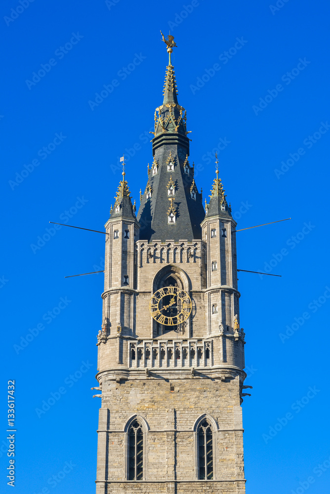 The Belfry tower with clock in Ghent, Belgium