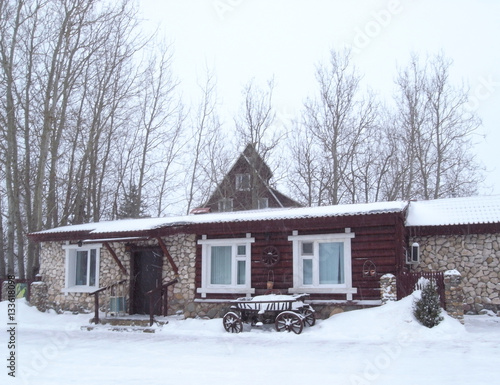 Russian Winter. Winter landscape. Cosy winter house. Morning. snowfall.