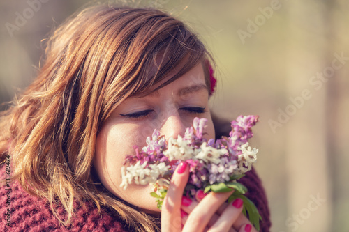 Girl with flowers in the park.  