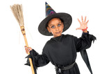 Young girl witch in Halloween