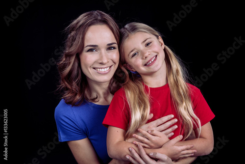 Beautiful smiling mother and daughter