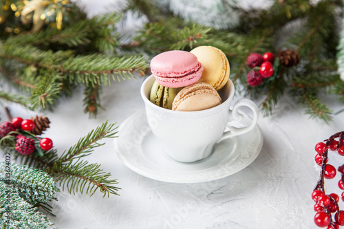 Macarons and Christmas background, selective focus, copy space