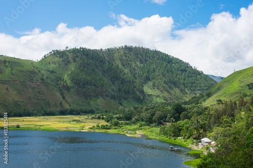 Bay at Lake Toba with rice fields, Indonesian landscape, North Sumatra