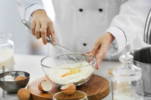 Cooking concept. Professional confectioner making delicious dessert, closeup