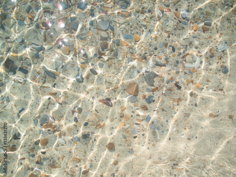 Fototapeta premium pebble and sand underwater in the beach for your background and texture