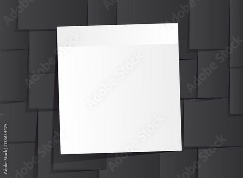 White stick note isolated on black background