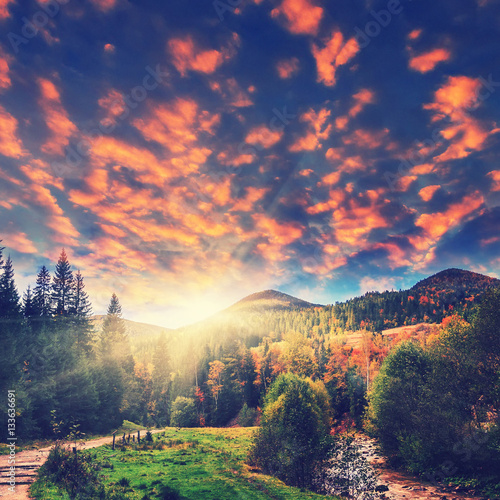 wonderful sunrise over the autumn mountains. majestic landscape. picturesque dramatic scene. artistic creative picture. instagram effect fairytale view in the autumn.