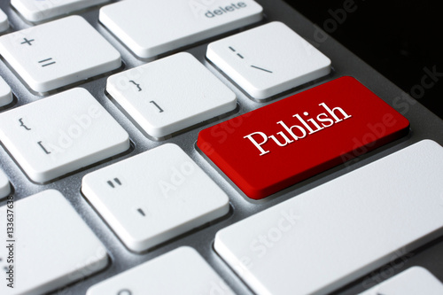Publish on Red Enter Button on white keyboard