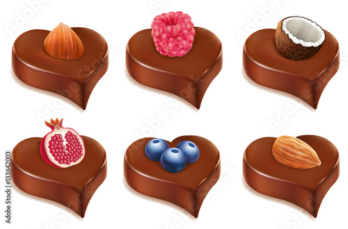 chococolate candy heart with, hazelnut, coconut, raspberry, blueberry, almond