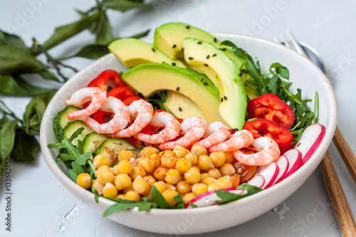 Healthy green salad with avocado and shrimp. Love for a healthy food concept