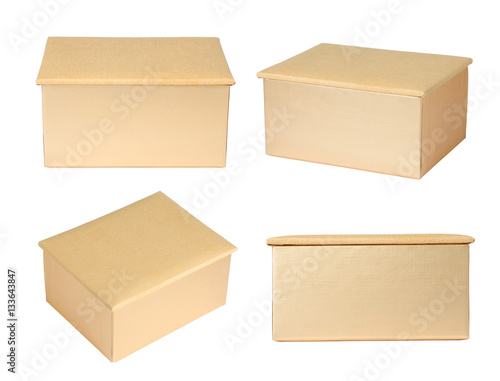 Gold paper boxes isolated on white background © koosen