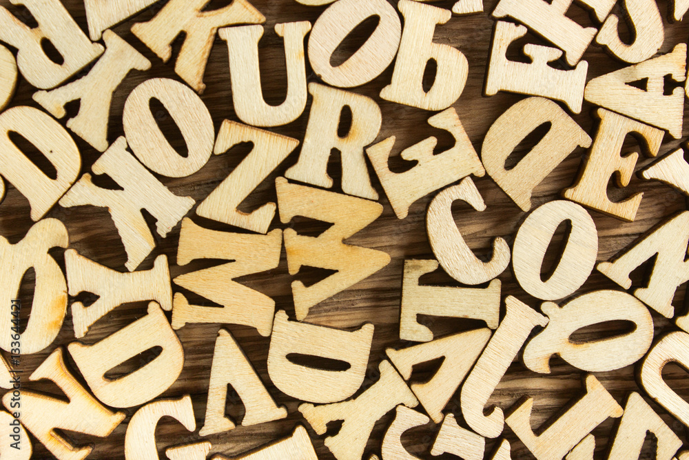 Close-up Letters of the alphabet made of wood for background Close-up Letters of the alphabet made of wood for background