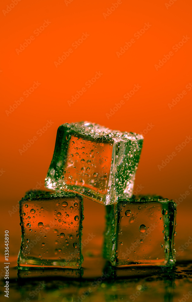 Ice cubes on colored backgrounds Ice cubes on colored backgrounds