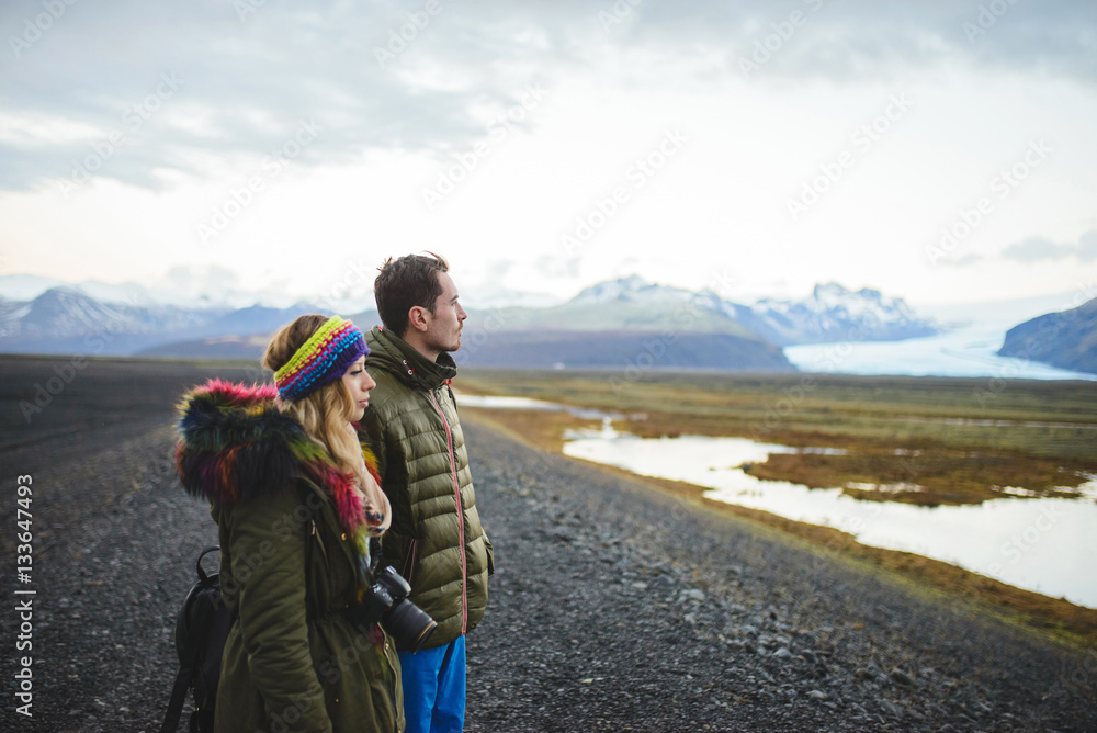 Couple Looking at Iceland Lake