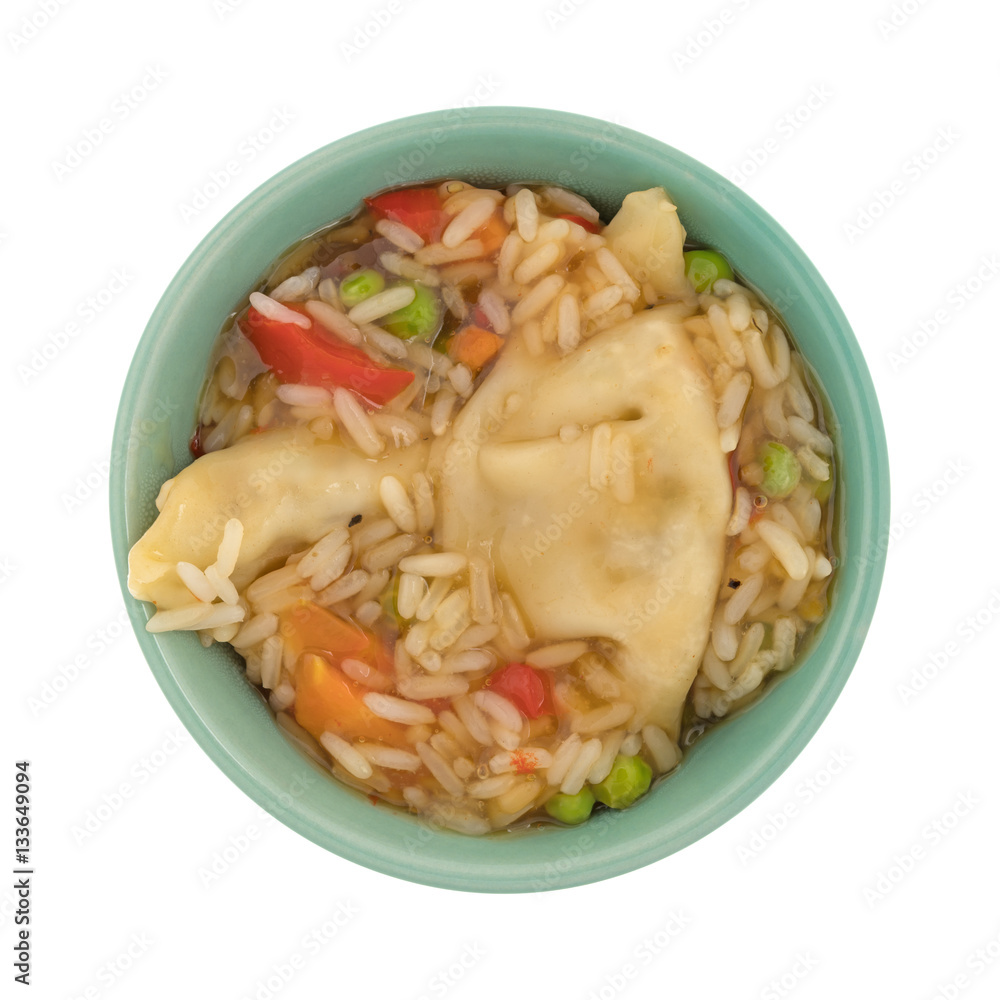 Vegetarian potstickers meal in a green bowl isolated on a white background. Vegetarian potstickers meal in a green bowl isolated on a white background.