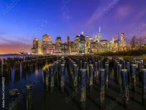 New York City Manhattan buildings skyline at night from Brooklyn