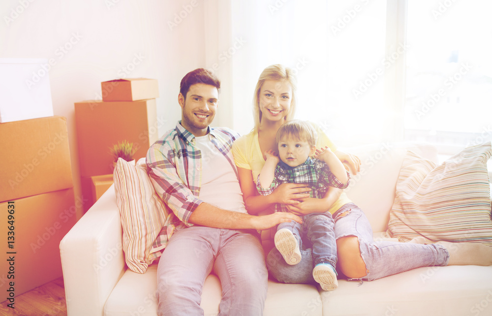 happy family with boxes moving to new home happy family with boxes moving to new home