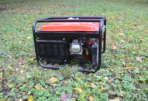 Gasoline Portable Generator. Close up on Mobile Backup Generator.