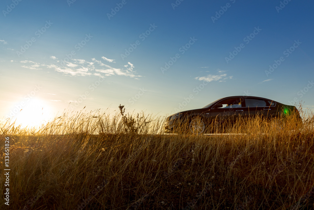 Silhouette car and bicycle in sunrise nature