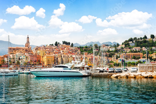 colorful houses of Menton old town harbor at summer day, France, retro toned