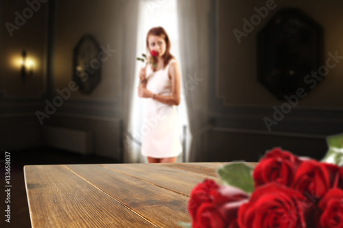 desk of free space and woman in home with rose 