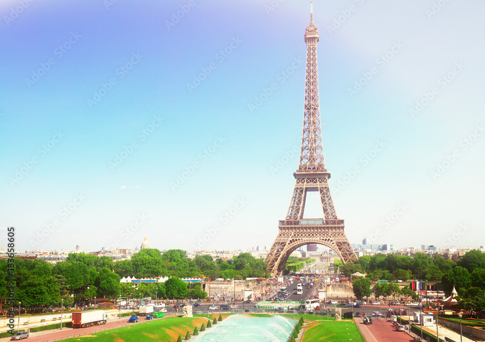 Fototapeta premium view of Eiffel Tower and Paris cityscape in summer day, France, retro toned