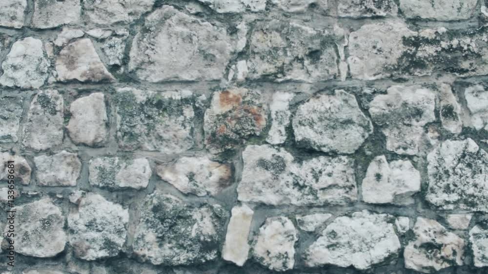 Steadicam close-up shot of ancient stone wall of a fortress. 4K video Steadicam close-up shot of ancient stone wall of a fortress. 4K video