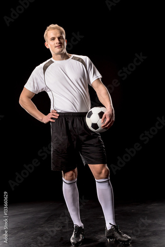 Soccer player with ball © LIGHTFIELD STUDIOS