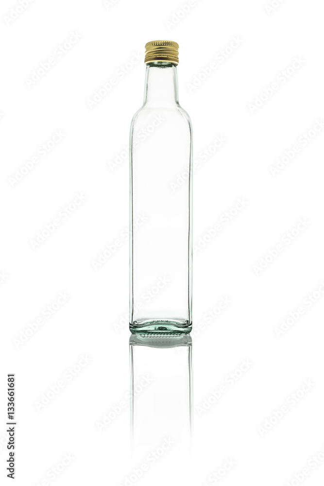 A small isolated bottle on a white background A small isolated bottle on a white background