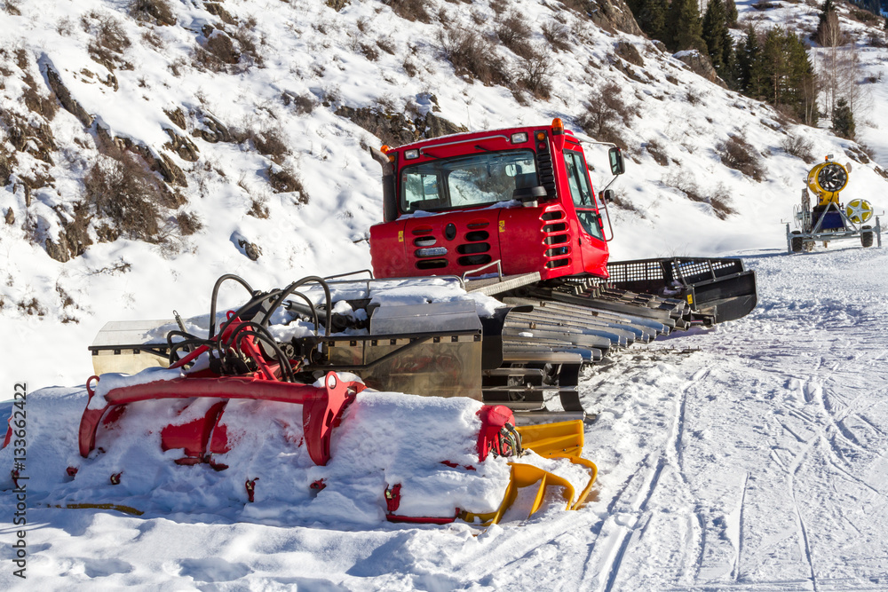 Naklejka premium snowcat and snow gun