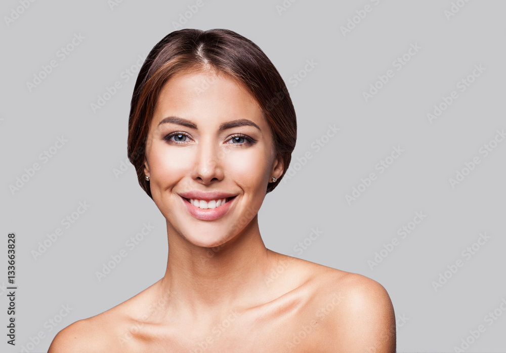 Studio portrait of a beautiful young woman with brunette hair. Pretty spa model girl with perfect fresh clean skin. Youth and skin care concept Studio portrait of a beautiful young woman with brunette hair. Pretty spa model girl with perfect fresh clean skin. Youth and skin care concept