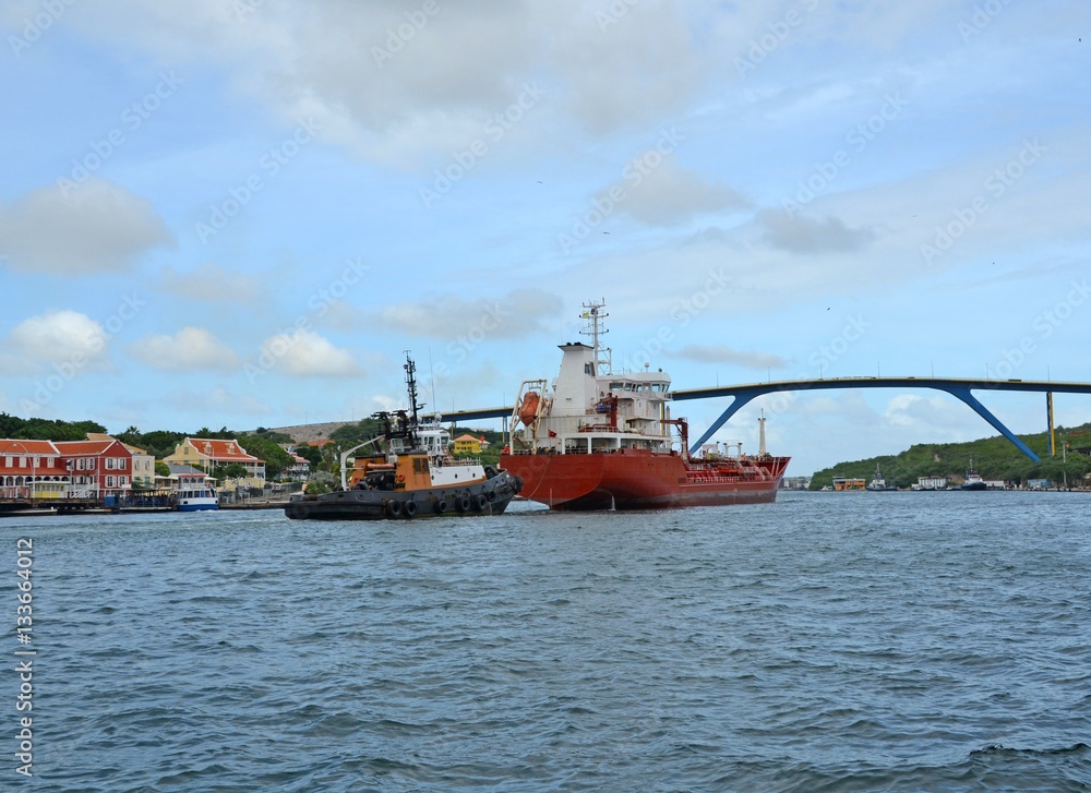 ship traffic near the Queen Juliana Bridge in the   St Anna Bay in Willemstad, Curacao