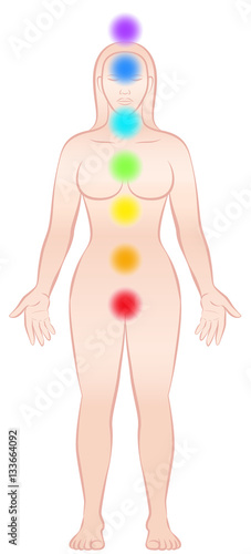 Meditating woman with chakras - standing yoga position.