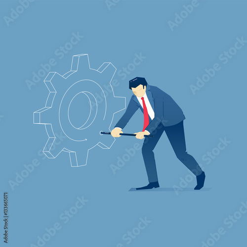 Businessman twirls a business machine