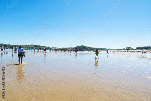 Suances beach full of bathers in summer