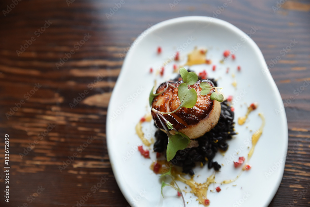 Seared scallop and garnish Seared scallop and garnish