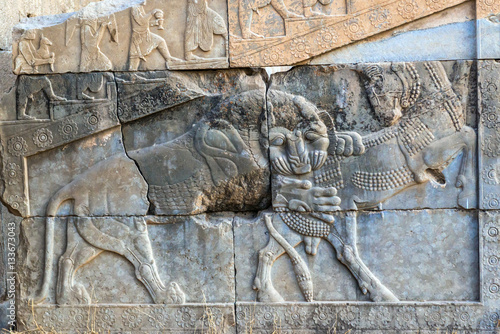 Bas relief in ruins of Persepolis ancient city in Iran photo