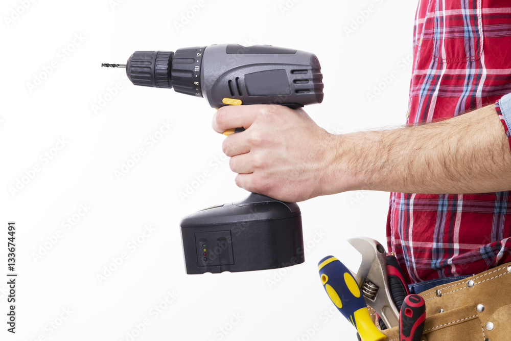 hand with the drill or screwdriver isolated, DIY and tools hand with the drill or screwdriver isolated, DIY and tools