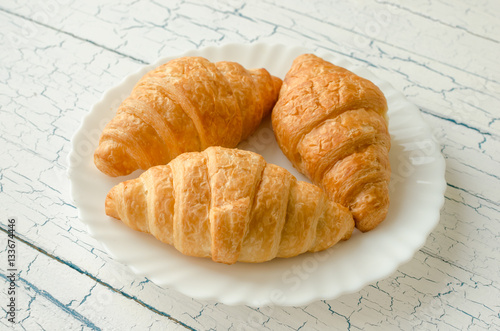 Croissants on a saucer photo