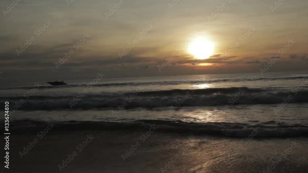 Sunset on the beach The evening before sunset on Karon Beach in Phuket, Thailand Sunset on the beach The evening before sunset on Karon Beach in Phuket, Thailand