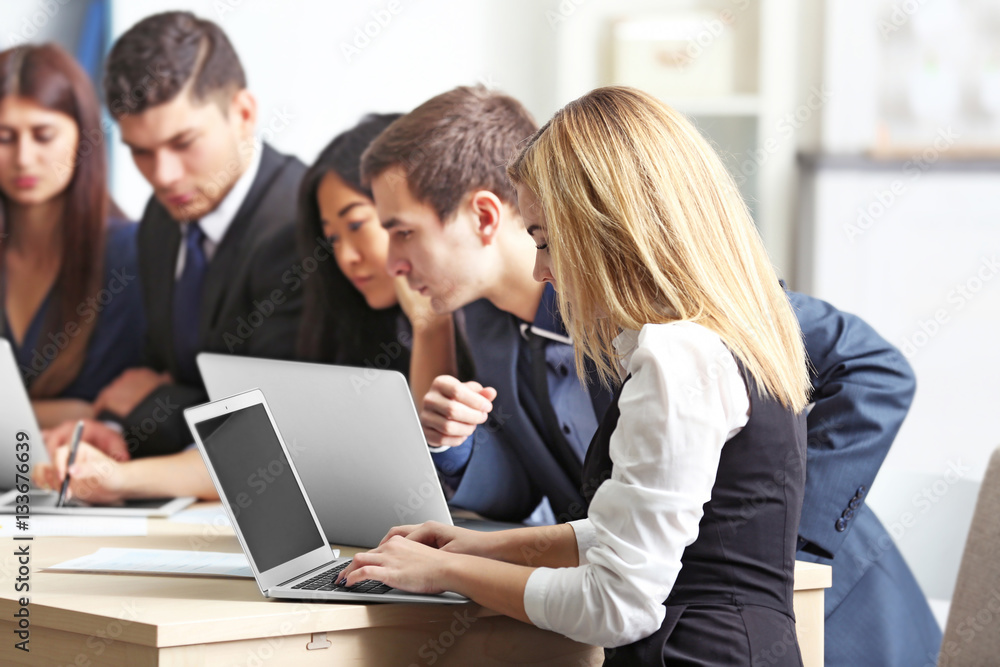 Business people working in conference room Business people working in conference room