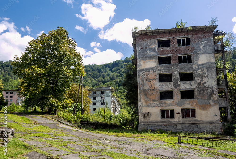 Abandoned mining ghost-town Polyana, Abkhazia. Destroyed empty houses 