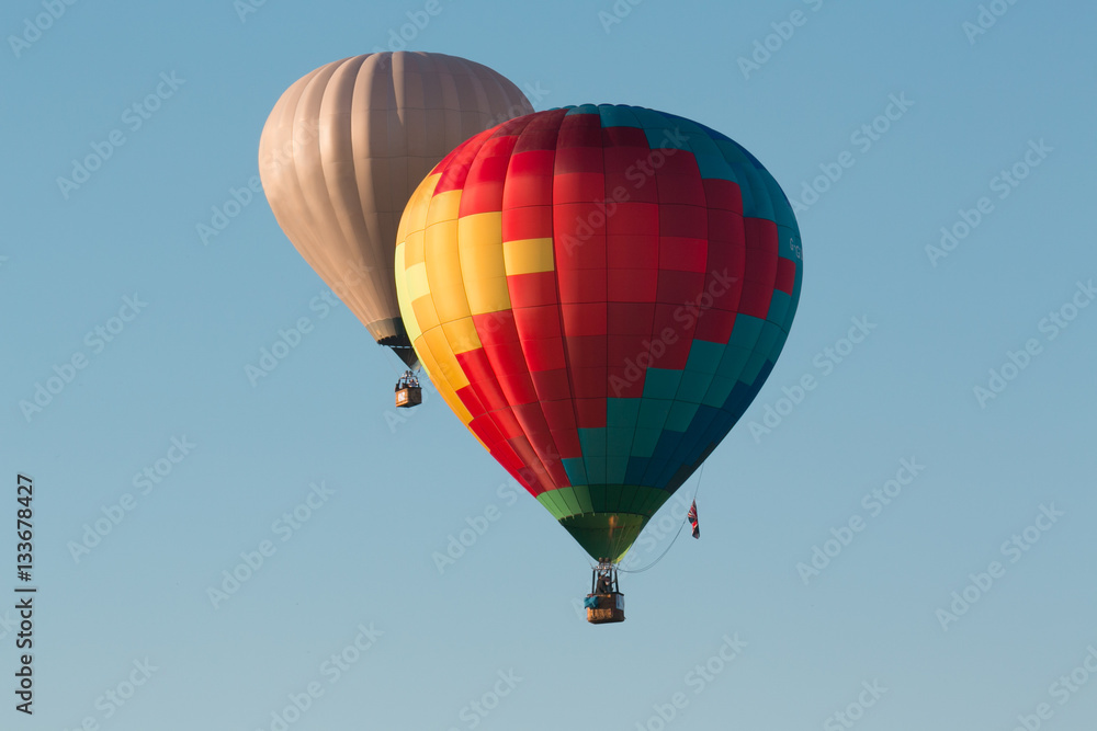 Fototapeta premium two flying hot air balloons