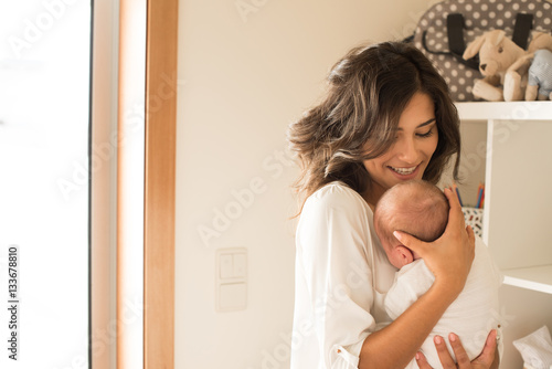 Woman with newborn baby