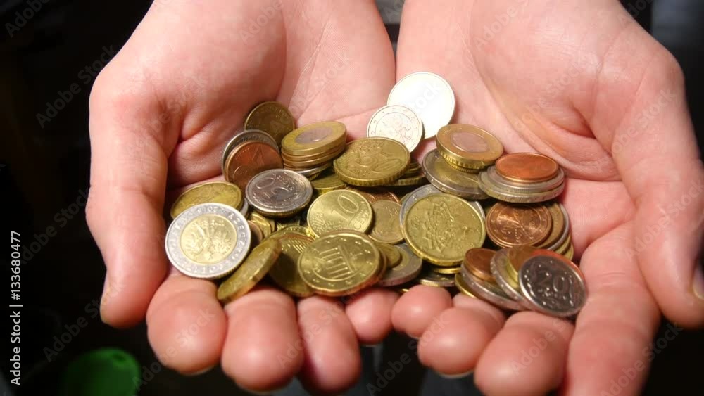 Close up of hands stacking coins, Money growing concept, Save money with stack money coin for growing your business Close up of hands stacking coins, Money growing concept, Save money with stack money coin for growing your business
