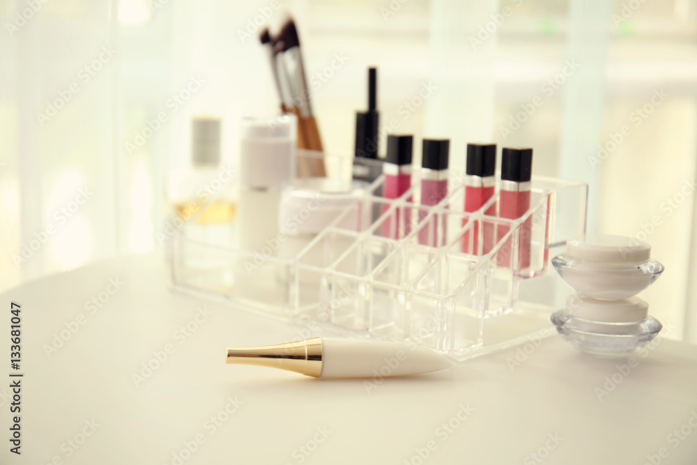 Set of cosmetics on white table