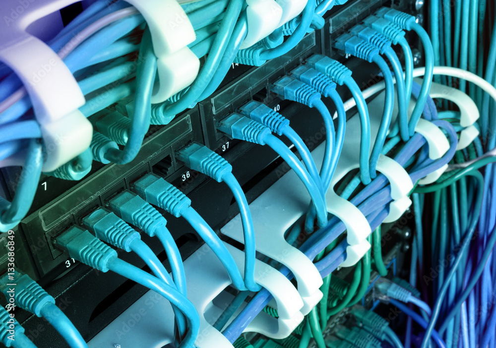 Server rack with blue internet patch cord cables Server rack with blue internet patch cord cables