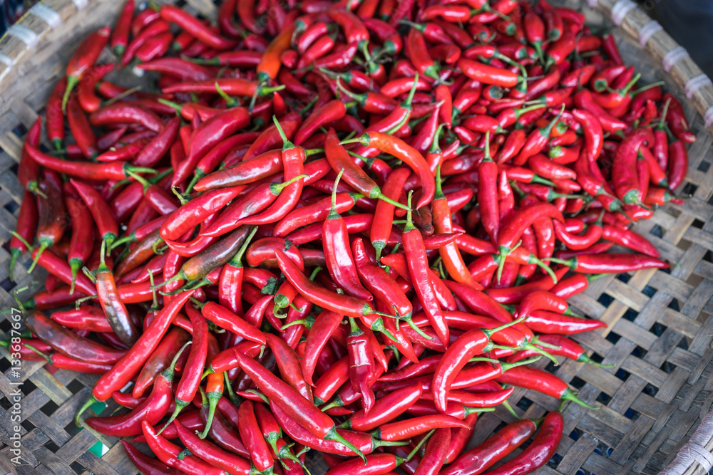 Fototapeta premium Red chilli, Chillies in basket on the market in Vietnam.