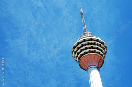 Travel in Malaysia. Kuala Lumpur Tower (Menara) on May 18, 2013 in Kuala Lumpur, Malaysia. The tower reaches 421 m, which currently makes it the second tallest freestanding tower in the world photo