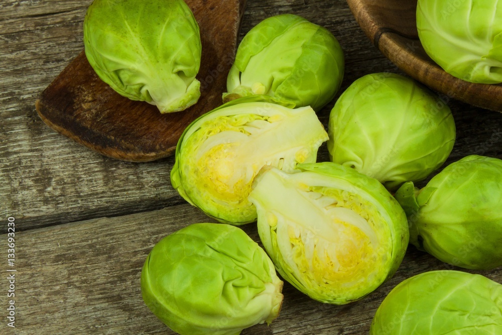 Brussels sprouts on old wooden table. Homework fresh vegetables. Growing vegetables on the farm. Preparing vegetarian food. Diet food. Brussels sprouts on old wooden table. Homework fresh vegetables. Growing vegetables on the farm. Preparing vegetarian food. Diet food.
